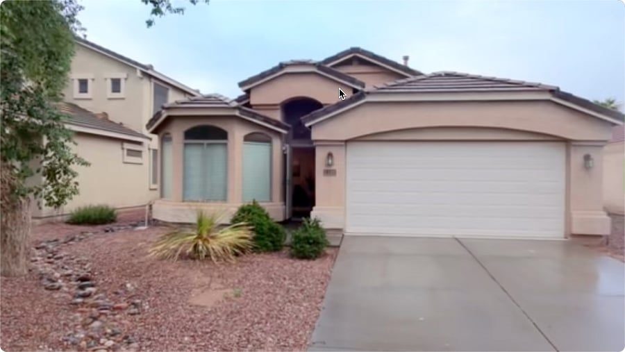Front exterior and two-car garage of the furnished house in Homestead North, Maricopa, Arizona